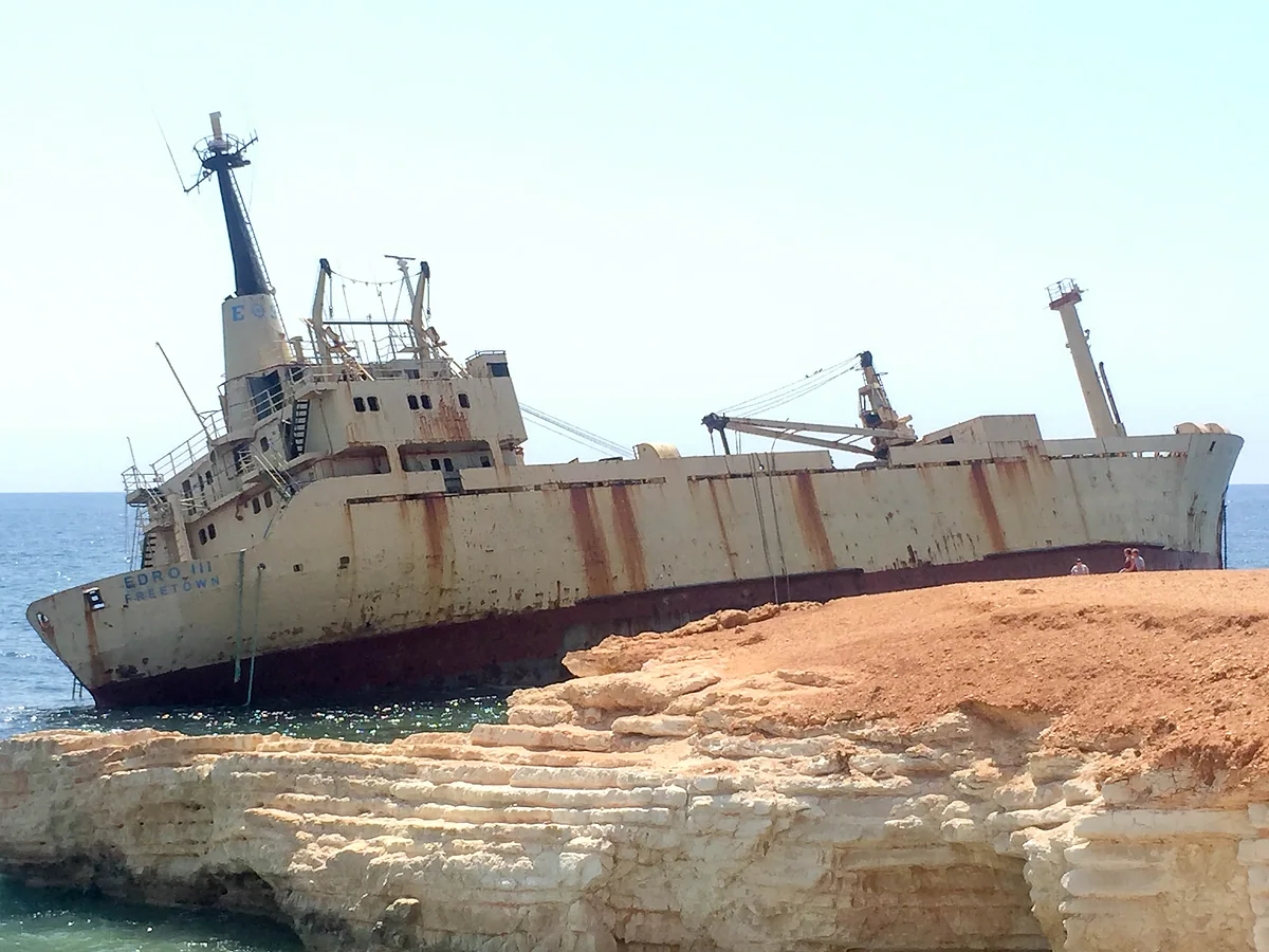 The cargo ship Edro III, stranded on the rocks of the Pegeia sea caves since the storm of December 2011, its hull streaked with rust