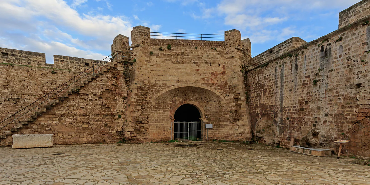 The Sea Gate bastion in Famagusta's walls, with its arched entrance, stone staircase and paved courtyard