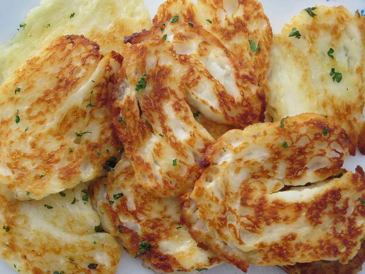 Slices of grilled halloumi, golden on the outside, one of the most typical ways the cheese is eaten in Cyprus