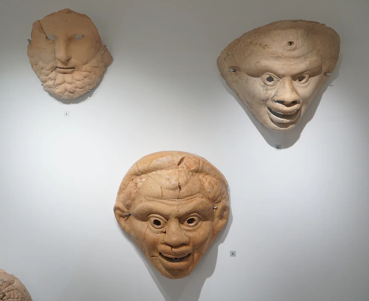 Terracotta theatre masks found at Nea Paphos and displayed in the Paphos District Archaeological Museum, Cyprus