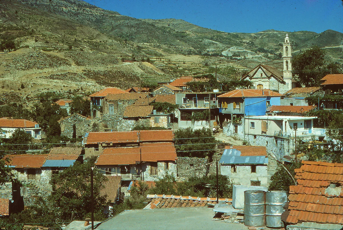 Laneia, one of the wine villages of Limassol district, with red-roofed houses and its church among vine slopes