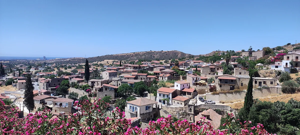 The village of Tochni, inland from Larnaca, with restored stone houses and flowering oleanders in front