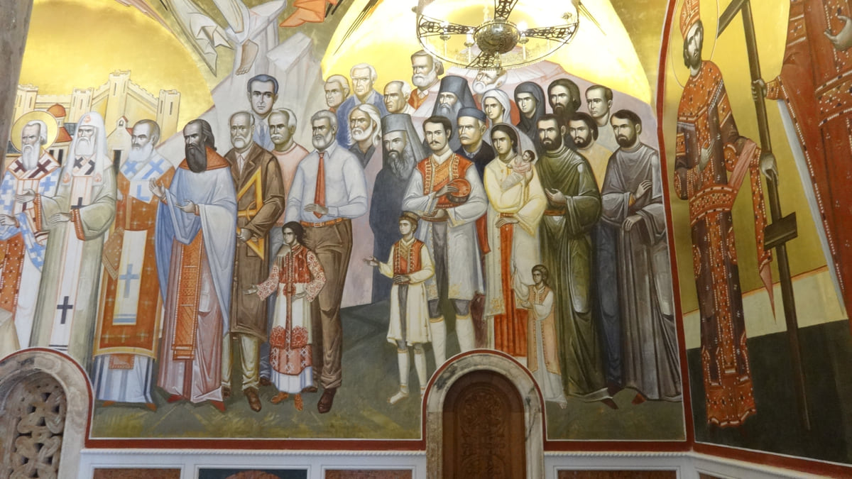 Saints painted on a gold background inside the Cathedral of the Resurrection of Christ in Podgorica, beneath a painted vault